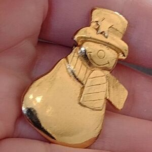 Vintage gold tone snowman brooch